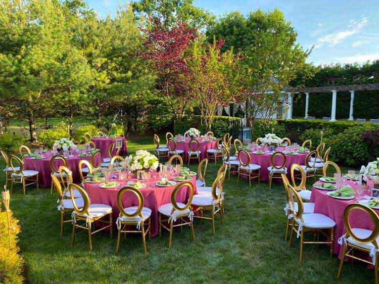 Wooden tables with various plastic or resin chairs